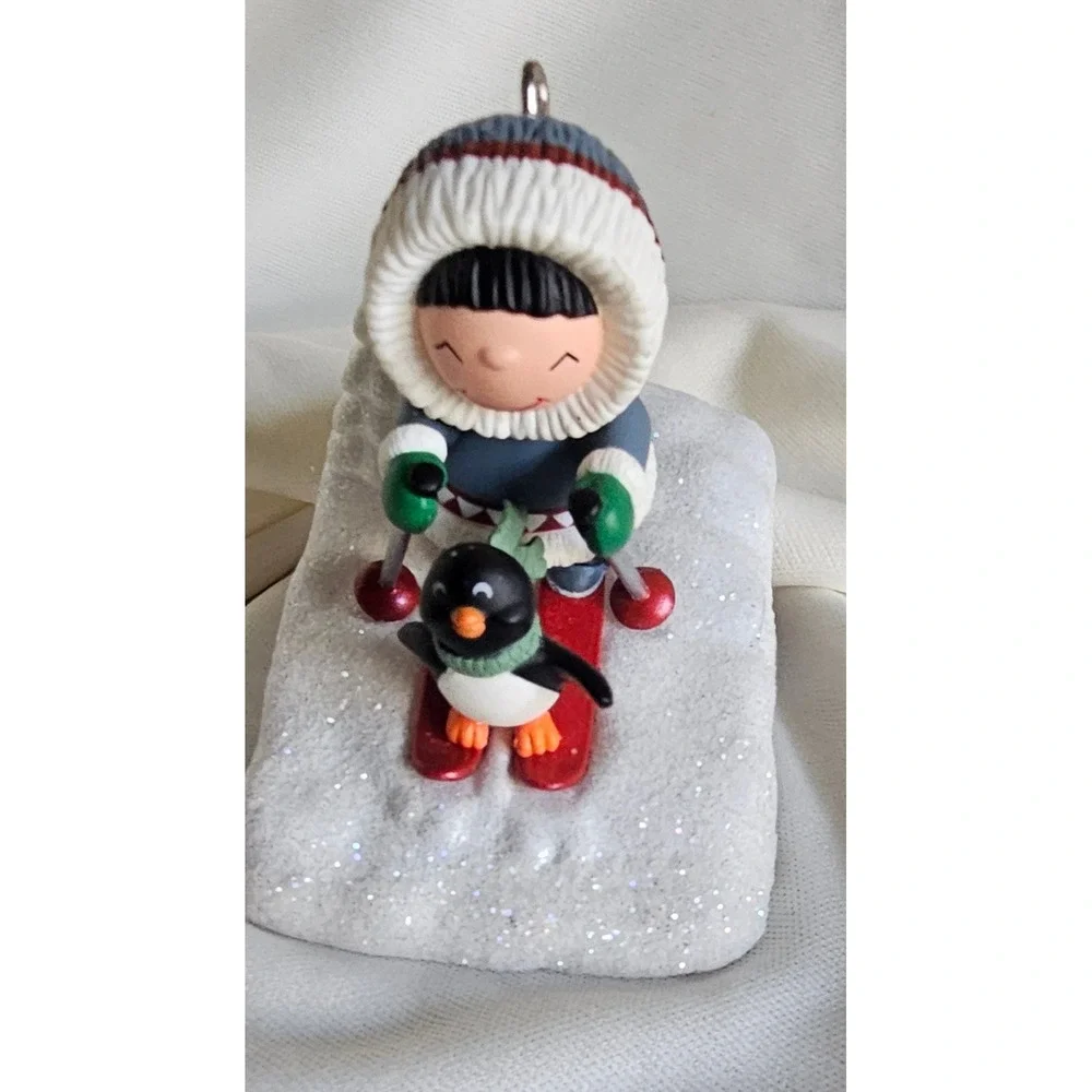 Hallmark Keepsake 2009 Eskimo and Penguin Skiing Christmas Ornament Winter Decor